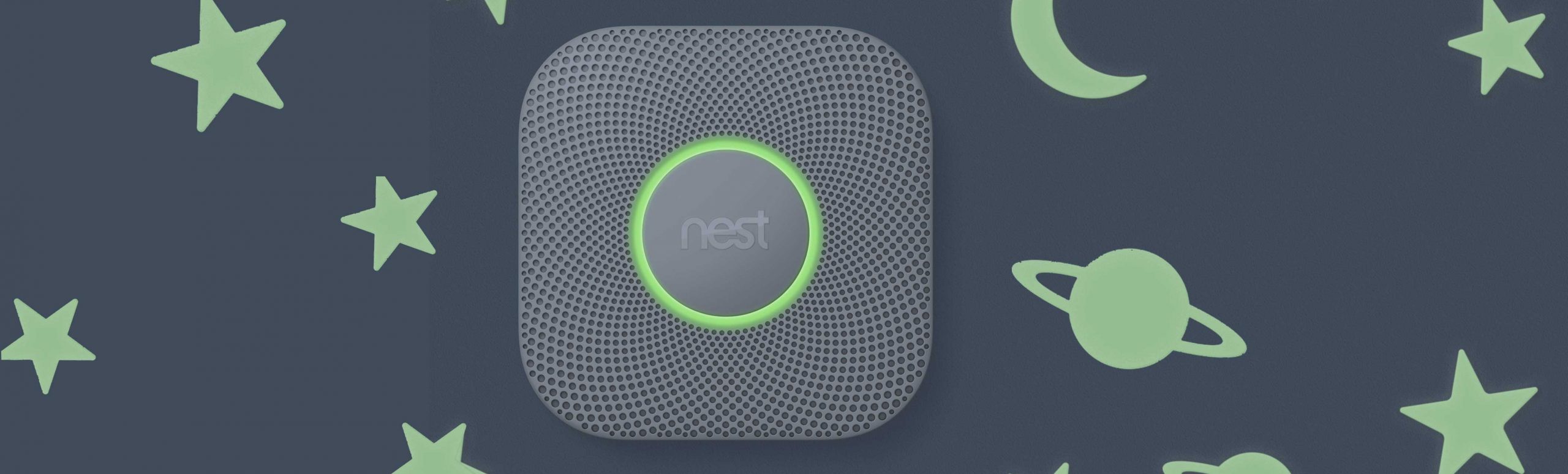 Google Nest Protect with stars, planets, and moons surrounding it