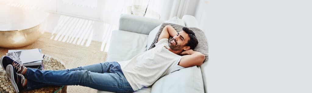 Man resting on his couch